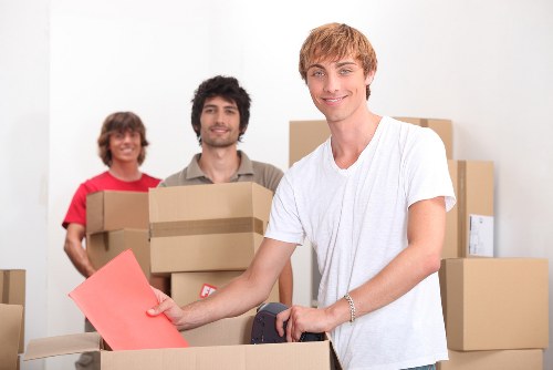 Packed boxes and furniture ready for house removals in Upminster Bridge